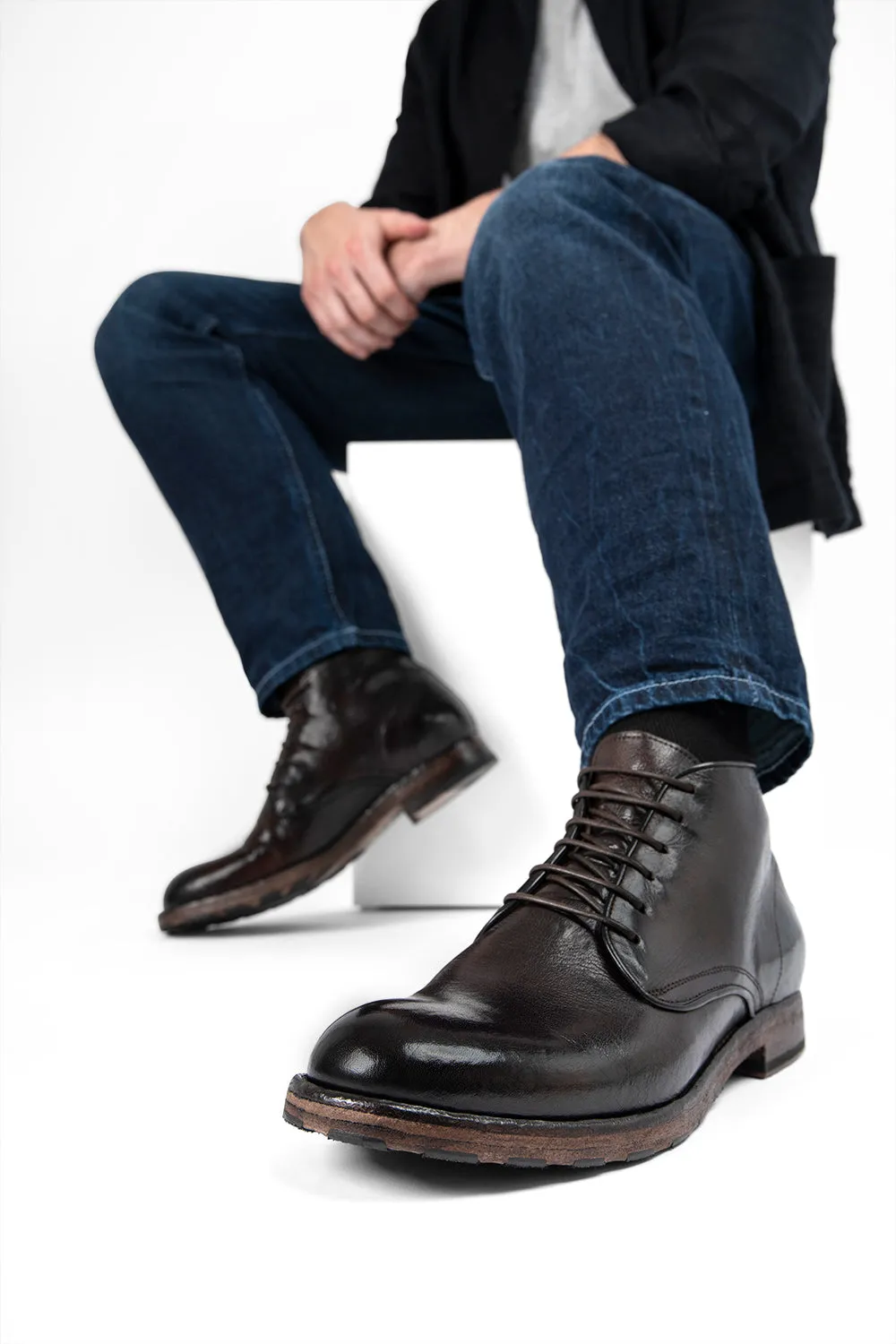 ASTON cigar-brown high chukka boots.