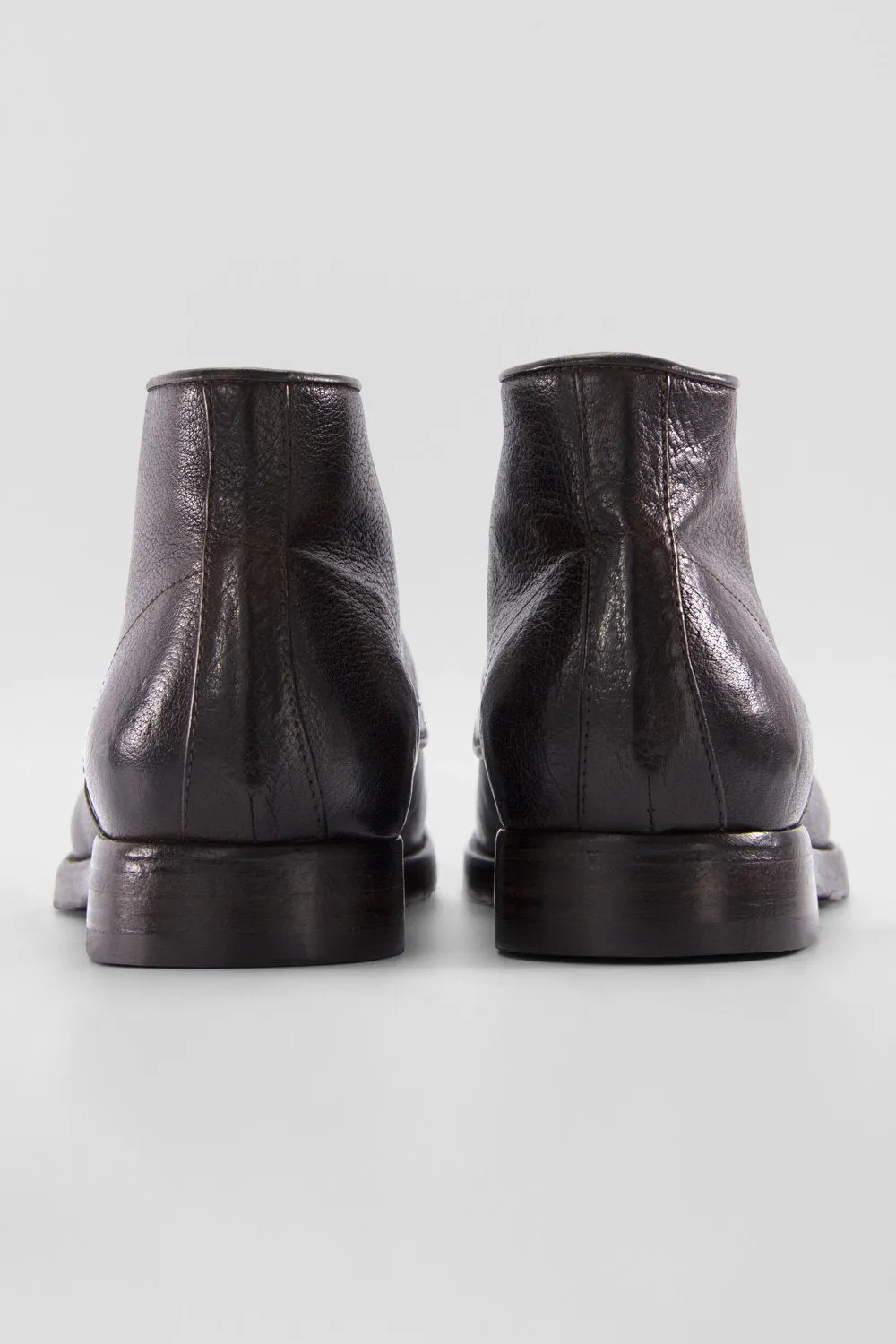 ASTON cigar-brown high chukka boots.