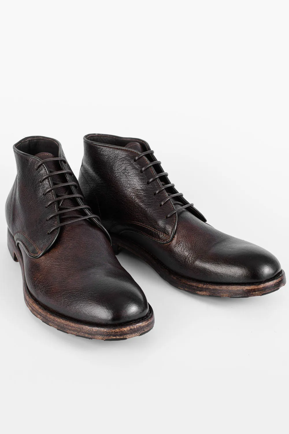 ASTON cigar-brown high chukka boots.