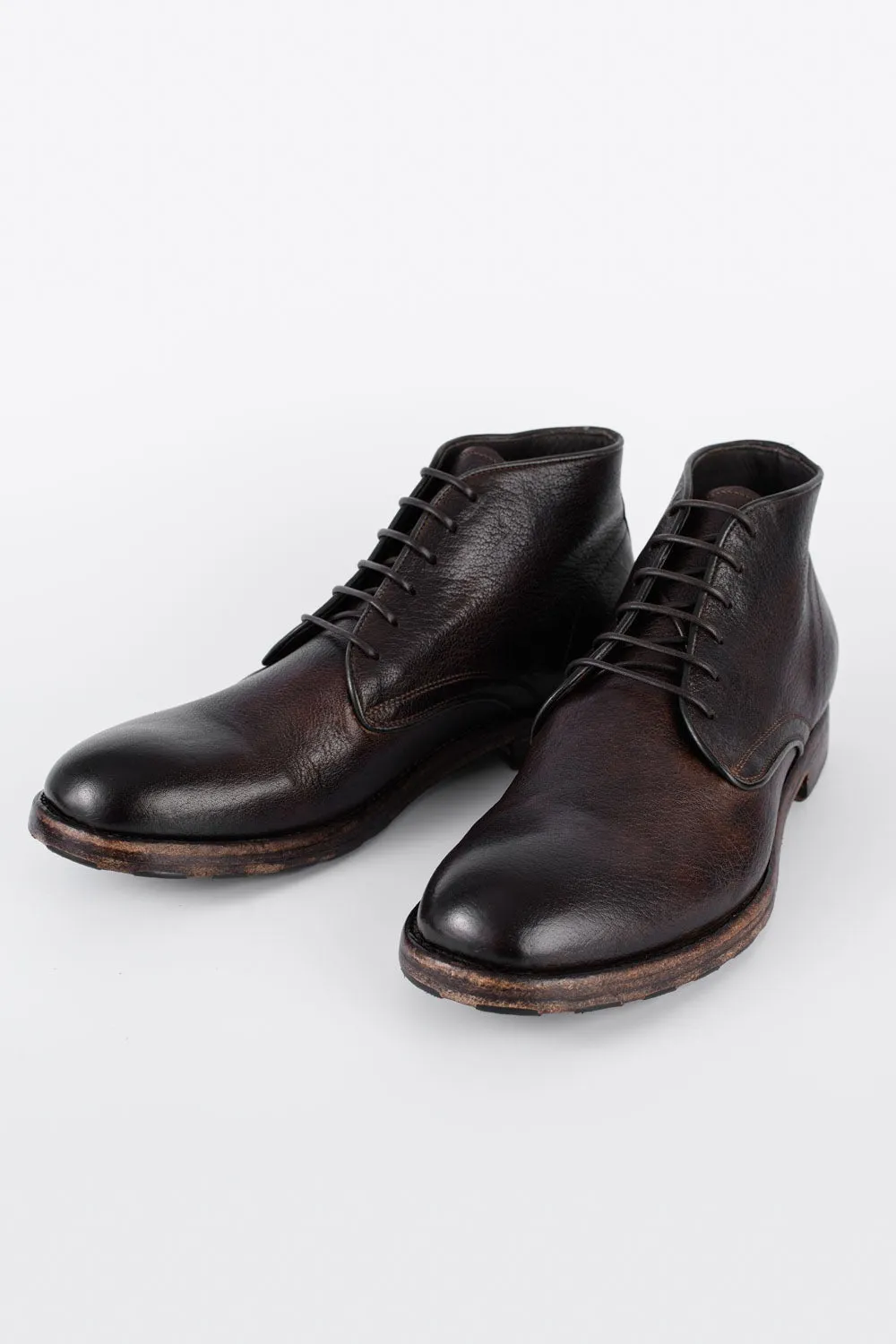 ASTON cigar-brown high chukka boots.