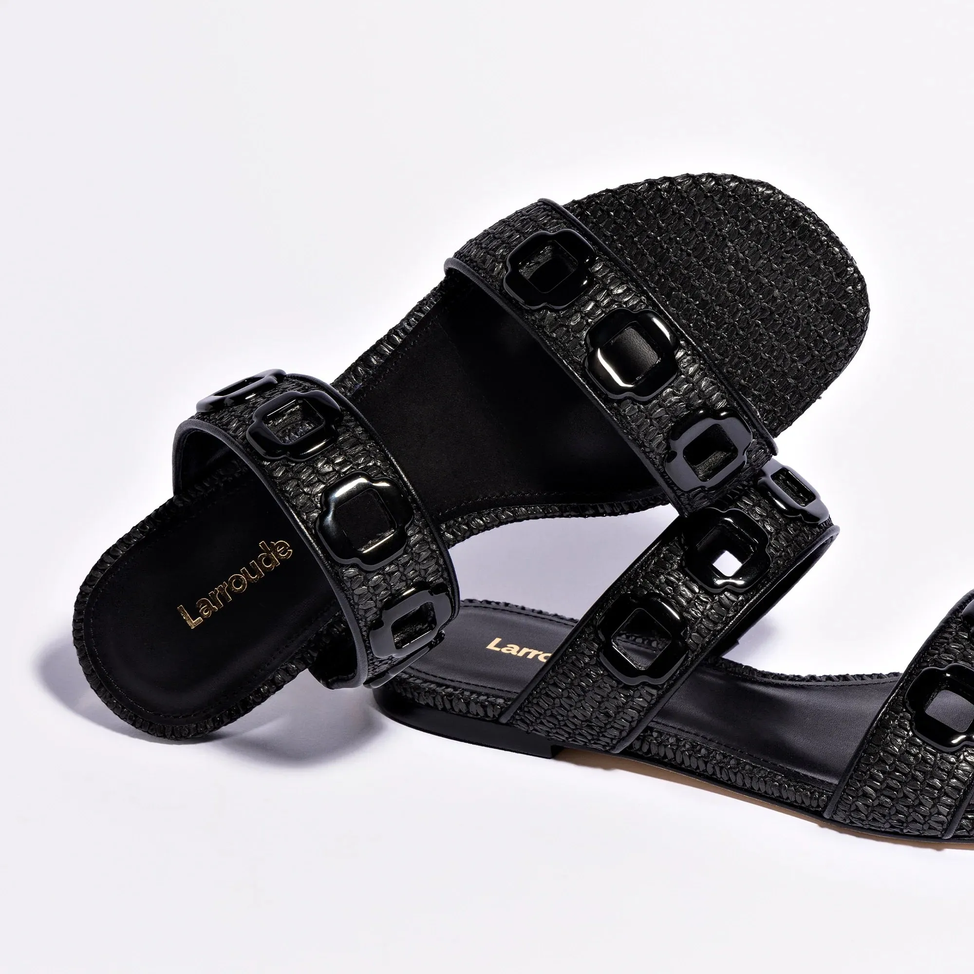 Larroude Milan Flat Mule In Black Wave Raffia